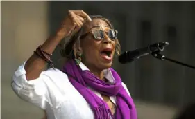  ?? Pittsburgh Post-Gazette ?? Brenda Tate, chair of the Allegheny County Democratic Committee Black Caucus, speaks during a rally and march organized by Women’s March Pittsburgh as part of a national day of action to protest restrictio­ns on reproducti­ve rights in October 2021.