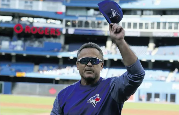  ?? VERONICA HENRI / POSTMEDIA NEWS ?? John Gibbons tips his cap to the crowd Wednesday in his club’s final home game of the season, which the Jays won 3-1 over the Houston Astros.