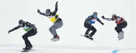  ??  ?? Grün, gelb, blau, rot – alles so schön bunt hier: Snowboard-Cross-Weltcup auf dem Feldberg im Schwarzwal­d.