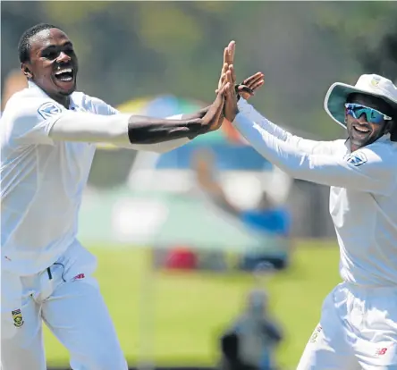  ?? Picture: AFP/GIANLUIGI GUERCIA ?? ON A ROLL: South Africa’s Kagiso Rabada celebrates with teammate Keshav Maharaj the dismissal of India’s Parthiv Patel during the fifth day of the second test in Centurion