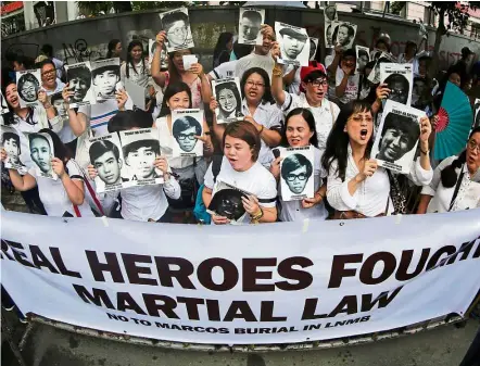  ?? — EPA ?? Not backing down: People protesting against the burial of late Filipino dictator Ferdinand Marcos at the Heroes cemetery, in front of the Supreme Court in Manila, Philippine­s.