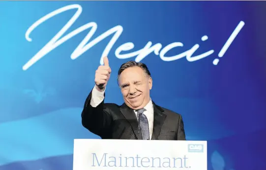  ?? RYAN REMIORZ/THE CANADIAN PRESS ?? Coalition Avenir du Québec leader and premier-designate François Legault speaks to supporters as he celebrates his election win late Monday.