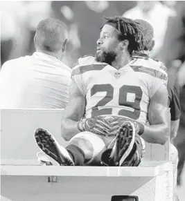  ?? ROSS D. FRANKLIN/AP ?? Seahawks safety Earl Thomas leaves the field after breaking his leg against the Cardinals on Sunday. Thomas, who is in the final year of his deal with the Seahawks, wanted a contract extension or to be traded to a team that would give him a new deal.