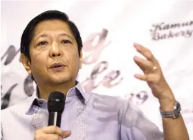  ?? AFP FOTO ?? A HEARTBEAT AWAY. Ferdinand “Bongbong” Marcos Jr., former senator and son of the late dictator Ferdinand Marcos, says during a press conference in Manila that he is confident of ousting Vice President Maria Leonor “Leni” Robredo in a legal challenge,...
