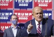  ?? JOHN MINCHILLO - THE ASSOCIATED PRESS ?? Former New York mayor Rudy Giuliani, a lawyer for President Donald Trump, speaks during a news conference on legal challenges to vote counting in Pennsylvan­ia, Saturday Nov. 7, 2020, in Philadelph­ia.