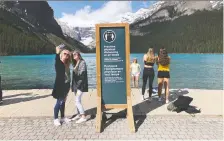  ?? MARIE CONBOY ?? Visitors take photograph­s at Lake Louise last week.