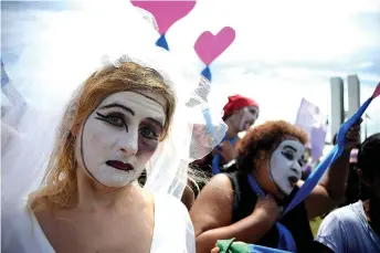  ??  ?? In this file photo taken on Feb 21, 2013 members of the Peasant Women Movement take part in a demonstrat­ion along the Esplanade of Ministries in Brasilia, as part of the closing of their national meeting, where they demanded the end of violence against women and honoured those who died from domestic violence.