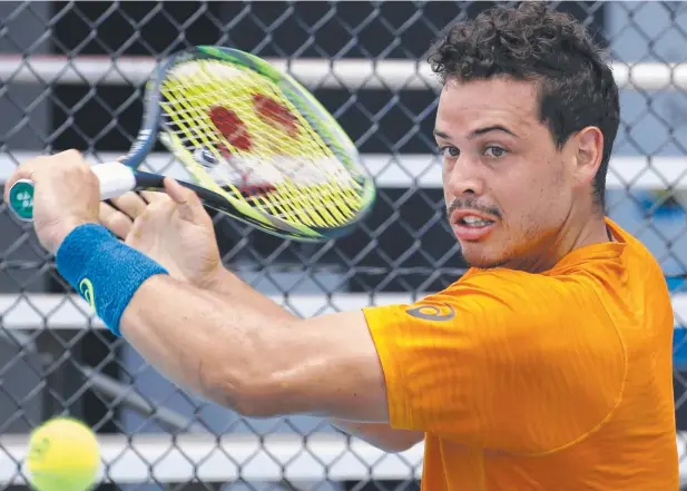  ??  ?? HARD-EARNED VICTORY: South Australian Alex Bolt on his way to a win against China’s Xin Gao at the Cairns Tennis Internatio­nal yesterday. Picture: ANNA ROGERS