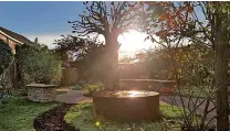  ?? ?? The garden of remembranc­e at Rainbows hospice, where Sophie died peacefully in the arms of her mother, Jane, and holding her father’s hand in 2015