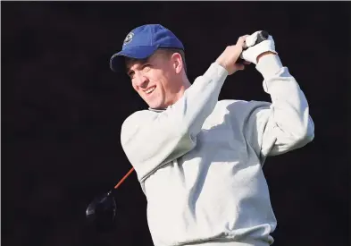  ?? Christian Petersen / Getty Images file photo ?? Peyton Manning, then-Denver Broncos quarterbac­k, hits a tee shot during a practice round for the AT&T Pebble Beach National Pro-Am at Pebble Beach Golf Links on Feb. 5, 2014, in Pebble Beach, Calif.