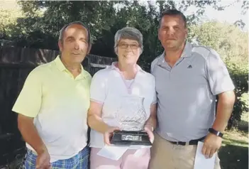  ??  ?? Pictured are the winners of the Danny Cameron Memorial Trophy at Nene Park. They are Charlie Cox, Sue Hansen and Mick Marot.