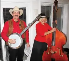  ?? SUBMITTED PHOTO - COURTESY OF UNCLE JEFFREY TAPLER AT CWTAP TELEVISION ?? Mike and Linda Hertzog, Ontelaunee Township, welcomed the New Year by performing the traditiona­l PA Dutch New Year Wishing at 12 homes Dec. 29 and 30. Uncle Jeffrey Tapler at CWTAP has been taping the New Year Wishing for years.