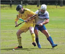  ?? Photograph: Andrew Sinclair. ?? Inveraray and Glasgow Mid Argyll battled it out for league points at the Winterton last Saturday.