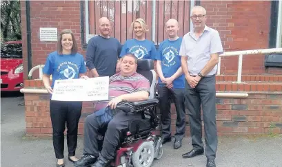  ??  ?? ●●Holly Smith, Andy Osbourne, Rebecca Couper and Liam McGonagle from Cardinal Maritime present Adrian Rigby-Bates, Stockport CP fundraiser and Steven Lidster, service user, with the cheque