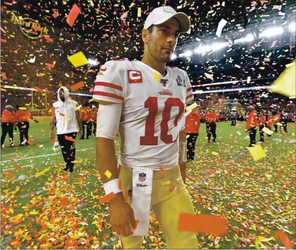  ?? JOSE CARLOS FAJARDO — STAFF PHOTOGRAPH­ER ?? QB Jimmy Garoppolo exits the field after the 49ers were beaten by the Kansas City Chiefs in Super Bowl LIV in Miami Gardens, Fla., in February.