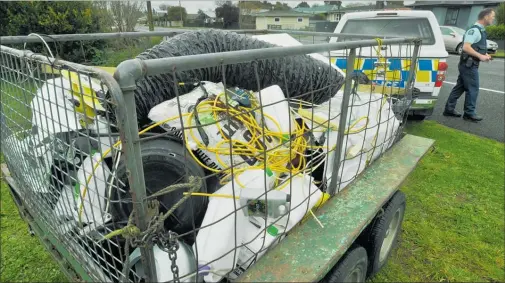  ?? PHOTO: CLINTON LLEWELLYN. ?? Police removed cannabis plants and this trailer full of growing equipment from the allegedly “very well equipped” indoor growing operation discovered inside a house on Tavistock Rd in Waipukurau .