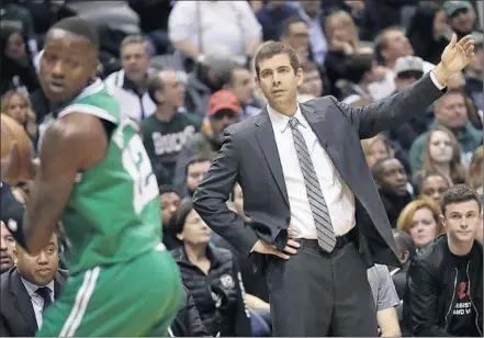  ?? Morry Gash Associated Press ?? BRAD STEVENS IS BEING hailed after an out-of-bounds play against the 76ers helped the Celtics advance. “I’ve learned to just trust his instincts and judgments,” center Al Horford said. “It just seems like he makes the right decision every time.”