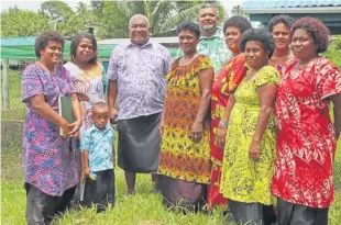  ?? Photo: JOSAIA RALAGO ?? Minister for Fisheries and Forestry, Kalaveti Ravu with the womens of Driti.