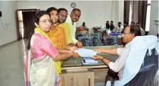  ?? ?? Nara Bhuvaneswa­ri filing the nomination papers on behalf of her husband and TDP national president N. Chandrabab­u Naidu, at Kuppam in Chittoor district on Friday.