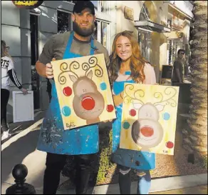  ?? The Ferraro Group ?? Washington Nationals slugger Bryce Harper and his wife, Kayla Harper, are shown Sunday at Pinot’s Palette at The District at Green Valley Ranch.
