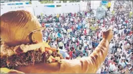  ?? HT PHOTO ?? People gather at the statue of Babasaheb Ambedkar at Pimpri in Pune, on Sunday.