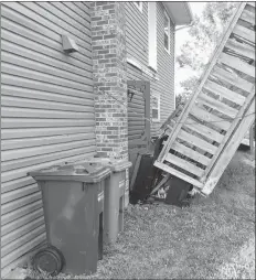  ?? SUBMITTED PHOTO ?? A barbecue and other items cover Rebecca MacNeill after she fell about 15 feet when her deck collapsed on Aug. 8.