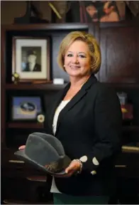  ?? RUSTY HUBBARD/THREE RIVERS EDITION ?? Penny Dietz and her husband, Mike, took over the family business in 2011 when her father died. The two are now co-owners of the real estate company, and Mike is the principal broker.