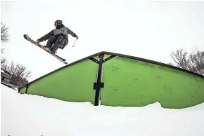  ?? DEVIL'S HEAD RESORT ?? A skier takes off from one of the features in the terrain park at Devil’s Head Resort in Merrimac.