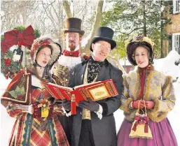  ??  ?? SING OUT: While powder covers Old Bedford Village (left) in Pennsylvan­ia, it’s time to go caroling in Staten Island’s Historic Richmond Town (above).