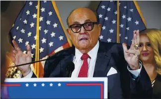  ?? JACQUELYN MARTIN — THE ASSOCIATED PRESS ?? Rudy Giuliani, a lawyer for President Donald Trump, is not listed as being paid by Trump’s campaign.