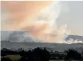  ??  ?? Smoke from a burnoff can be seen west of Timaru on August 31.