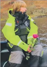  ?? ?? Catriona Lockhart, going out to leave a flower at the spot where her partner died in 2020, spoke at the Inverness event last week.