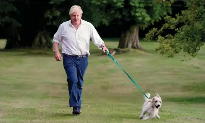  ?? Photograph: Andrew Parsons/No 10 Downing Street ?? ‘Think about it. That wild thing you see in the photograph­s, dragging Boris Johnson round, is actually Johnson himself.’