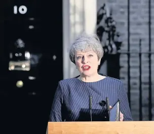  ??  ?? ●●Prime Minister Theresa May announcing the snap general election outside 10 Downing Street on Tuesday