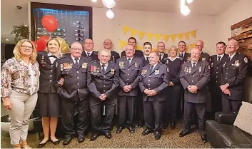  ?? ?? Among the service award medal recipients are (back, from left) David Harlow, Mark Dryden, Andy Runciman, Jesse Craig, Mick Crawford, Judy Brown, Alister Noonan, Rod Atkinson, Marcus Achilles and RayCrawley (front) Kylie Crawford, Natalie Young, John Atkins, Ken Craig, Mick Lee, Donald “Hec” Hogan and Darren Fox.