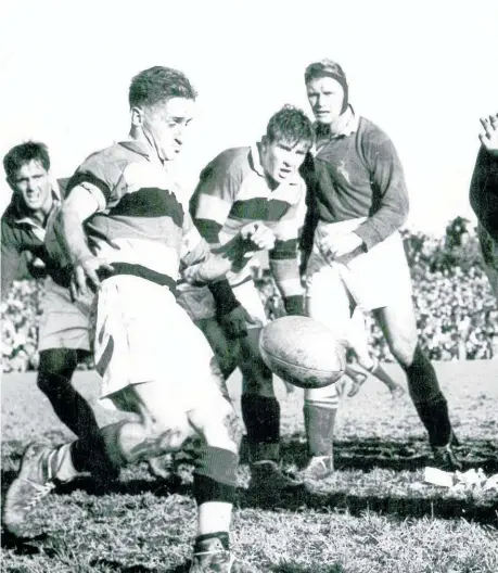  ??  ?? Ponty Reid gets in his clearing kick as the Springboks head for him during the 1956 tour.