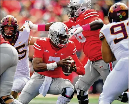  ?? JAMIE SABAU / GETTY IMAGES ?? After throwing for 412 yards and three touchdowns in a win over Minnesota on Saturday, Dwayne Haskins became the only Ohio State quarterbac­k with two 400-yard passing games.