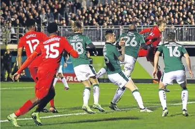  ?? Picture: Getty. ?? Lucas Leiva’s header booked Liverpool’s place in the fourth round of the FA Cup.