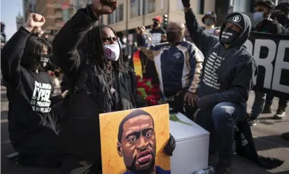  ??  ?? A rally for George Floyd in Minneapoli­s, Minnesota on 7 March 2021. Photograph: Jerry Holt/AP