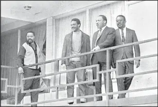  ?? Associated Press ?? MARTIN LUTHER KING JR., second from right, on the balcony of the Lorraine Motel in Memphis, Tenn., on April 3, 1968. He was assassinat­ed the next day while standing on the same balcony.