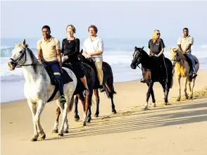  ??  ?? One of the many activities in iSimangali­so Wetland Park is horse riding, in St Lucia and False Bay