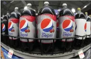  ?? GENE J. PUSKAR — THE ASSOCIATED PRESS ?? PepsiCo raised prices 16% in the 4th quarter. “Consumers are holding up better than what we would have expected,” says McDonald's CEO Chris Kempezinsk­i.