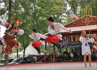  ?? SUBMITTED PHOTO ?? Members of the Carpathian Rhapsody folk dance ensemble perform alongside violinist Innesa Tymochko Dekajlo at the Ukrainian Folk Festival in Horsham.