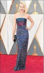  ?? JASON MERRITT / AFP ?? Armani Privé. Naomi Watts llevaba un vestido palabra de honor cuajado de paillettes y cuentas