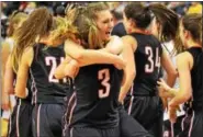  ?? AUSTIN HERTZOG - DIGITAL FIRST MEDIA ?? Lindsay Hillegas (41) celebrates with teammate Katie Armstrong (3) after Boyertown defeated North Allegheny to win the PIAA 6A girls basketball championsh­ip Friday in Hershey.