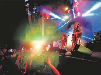  ?? Photograph­s by Jenna Schoenefel­d For The Times ?? SLAYER PERFORMS in San Bernardino in June. Its new album is its highest-charting debut.