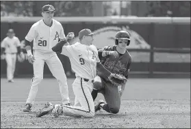  ?? NWA Democrat-Gazette/J.T. WAMPLER ?? Arkansas shortstop Jax Biggers makes the throw to first to complete a double play in the top of the third inning of the Razorbacks’ 11-4 victory over Kent State on Sunday.