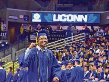  ?? Jason Sheldon/UConn photo ?? More UConn graduates are choosing to stay in Connecticu­t for jobs and graduate school, according to new data from the university.