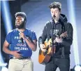  ??  ?? Khalid, left, and Shawn Mendes.