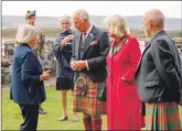  ?? ?? Right: King Charles and the Queen Consort - then Prince Charles and Camilla - on a visit to Skye in September 2021.